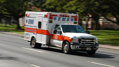 A speeding ambulance, with motion blur