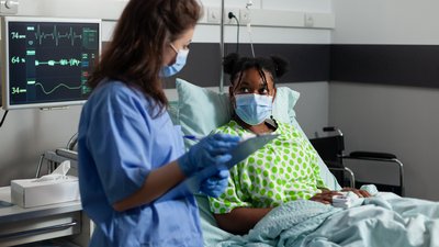 African american young patient with protection face mask