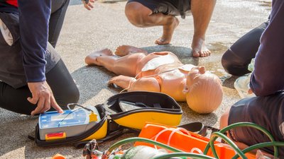 CPR child dummy drowning and use AED or PAD resuscitate