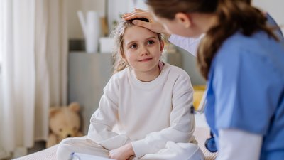 Child looking at Medical Professional