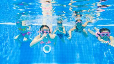 Children swim in pool