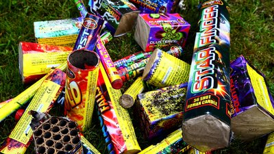 Heap of used burnt firework shells left over from a bonfire night celebration