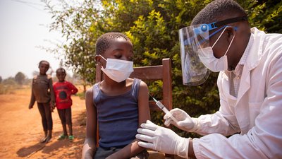 Open air vaccination session in an african village during corona virus pandemic