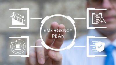 Person using virtual touch screen push the inscription EMERGENCY PLAN
