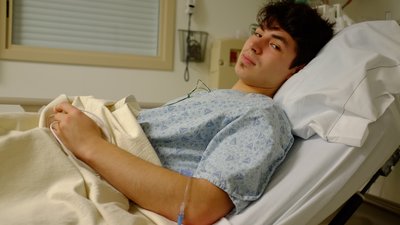 young man at the hospital on hospital bed